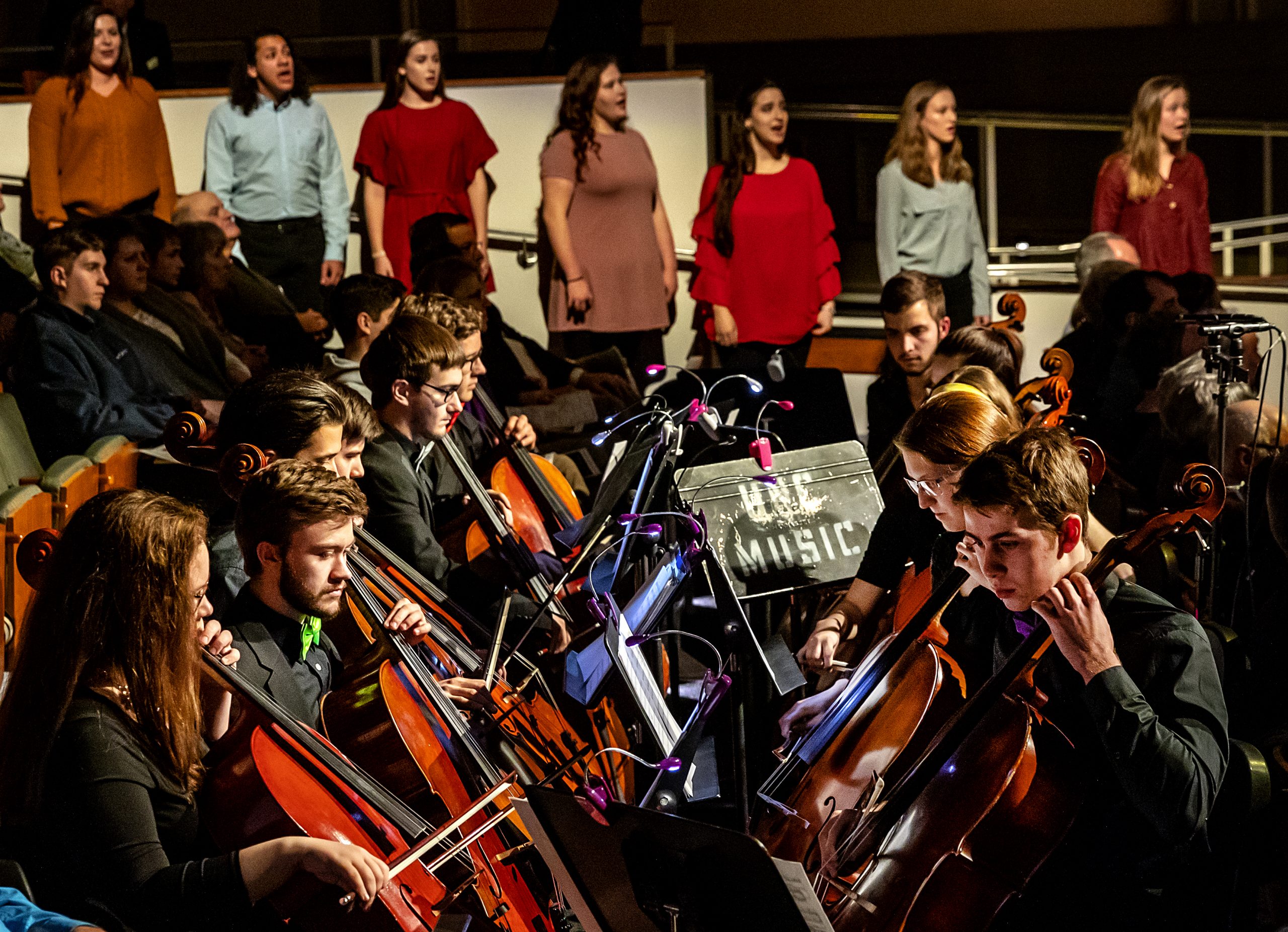 A group of students plays their cellos in UNC Music's Spectrum concert at Moeser Auditorium.