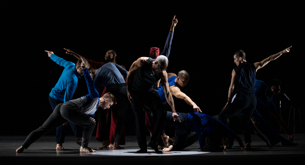 Dancers point dramatically in different directions while performing What Problem? by Bill T Jones/Arnie Zane Company.