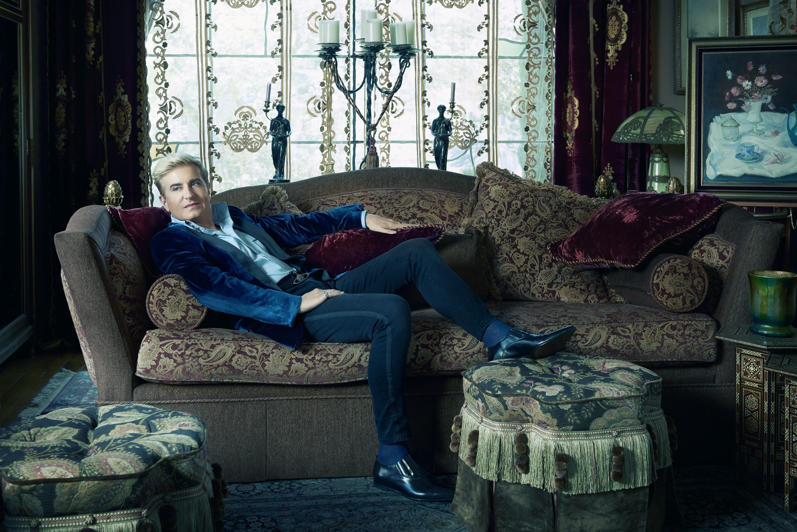 Image of Jean-Yves Thibaudet on a couch.