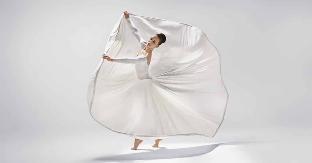 Martha Graham Dance Company dancer dressed in white.